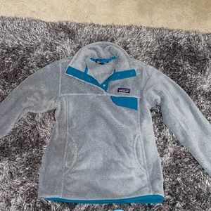 grey and teal Patagonia fleece